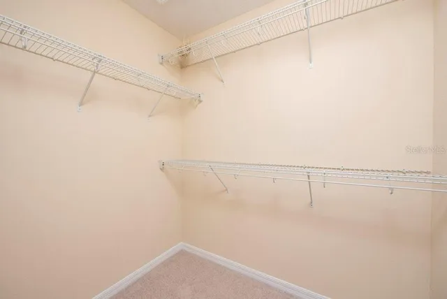 a view of a room with racks on the wall