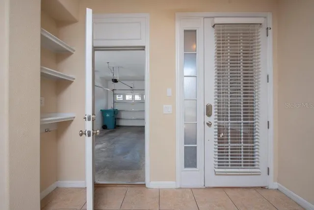 a view of kitchen and utility room