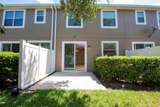 a view of a house with a garden