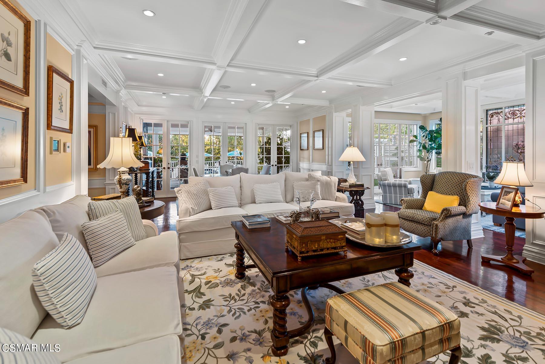 2155 Upper Ranch Road Westlake Village, CA 91362 - Photo 16 of 52 a living room with furniture a rug and a chandelier