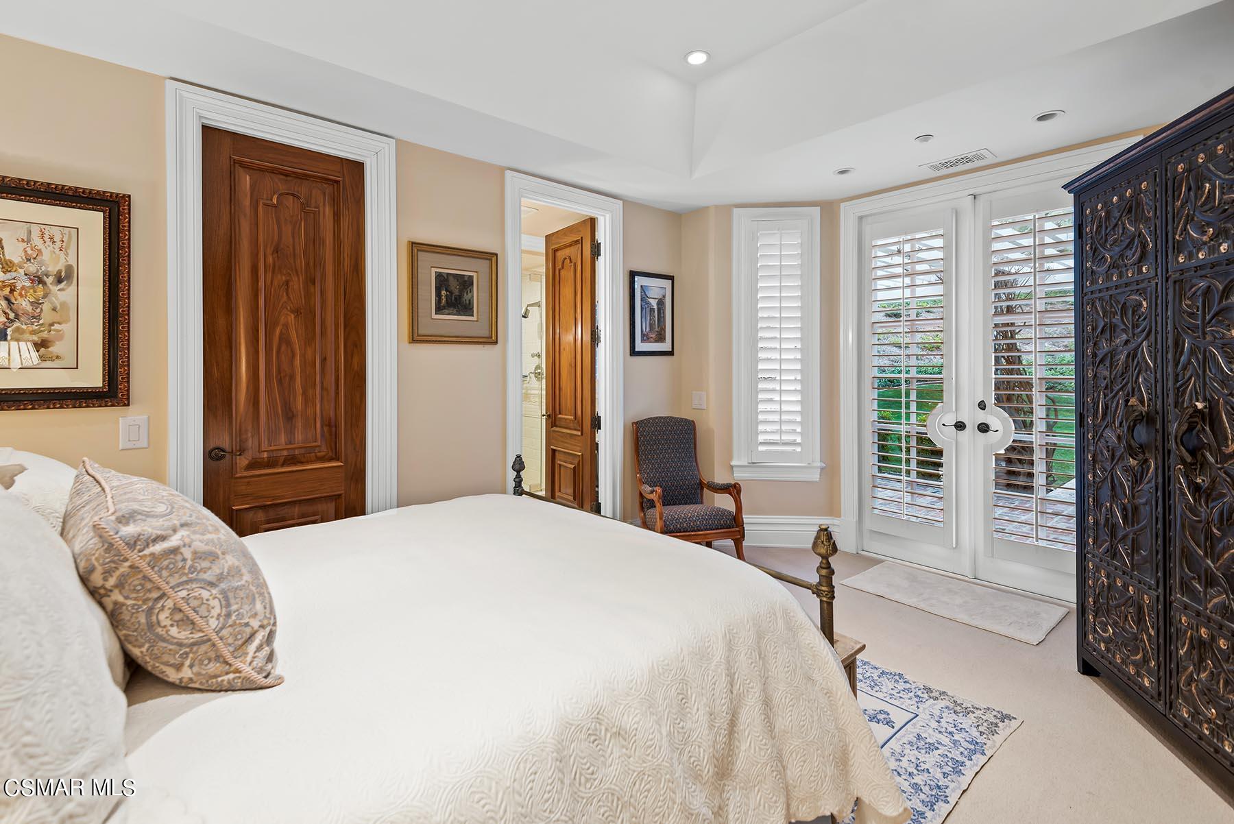 2155 Upper Ranch Road Westlake Village, CA 91362 - Photo 32 of 52 a bedroom with a large bed and a window