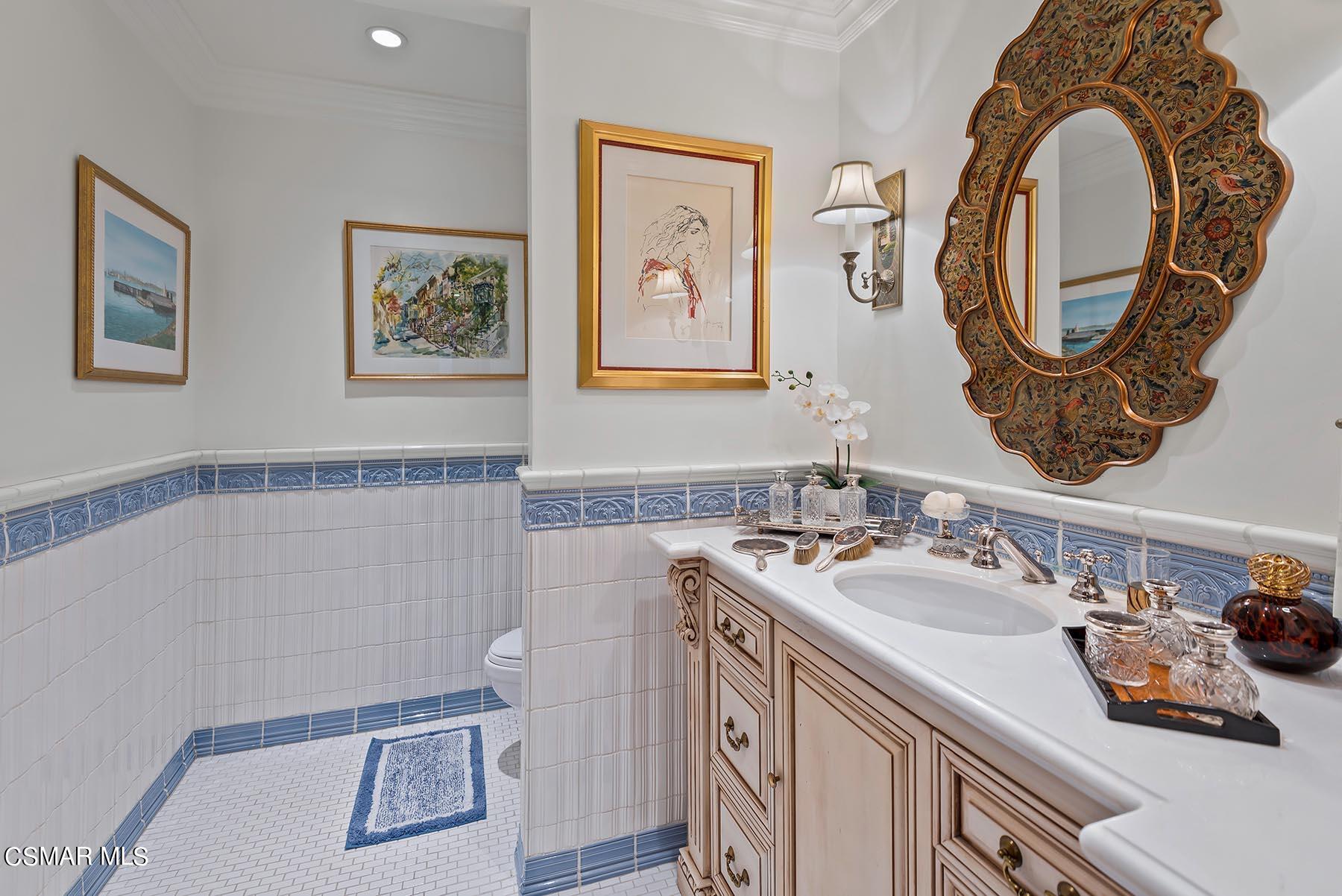 2155 Upper Ranch Road Westlake Village, CA 91362 - Photo 34 of 52 a bathroom with a sink and a mirror