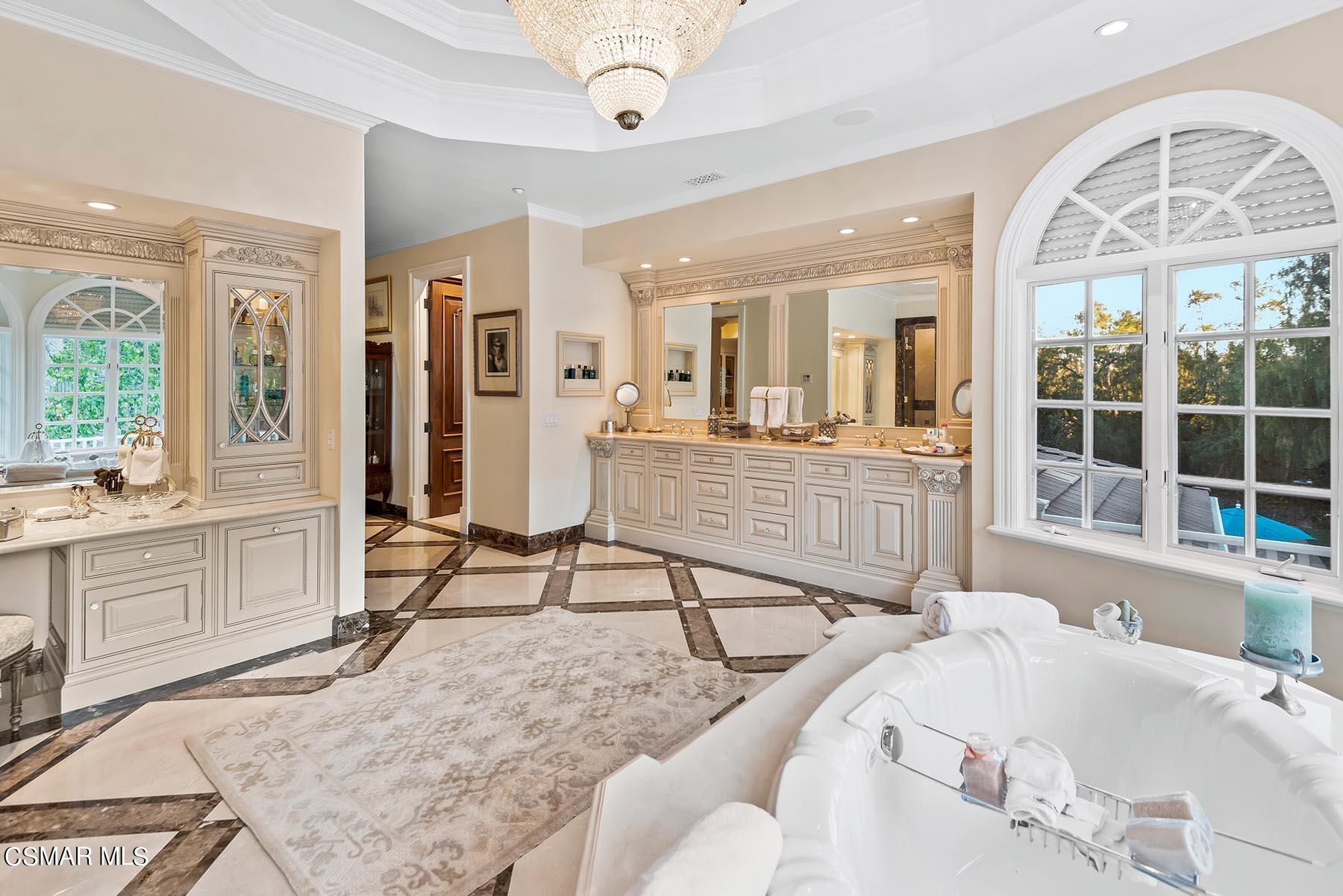 2155 Upper Ranch Road Westlake Village, CA 91362 - Photo 41 of 52 a bedroom with furniture and a large window