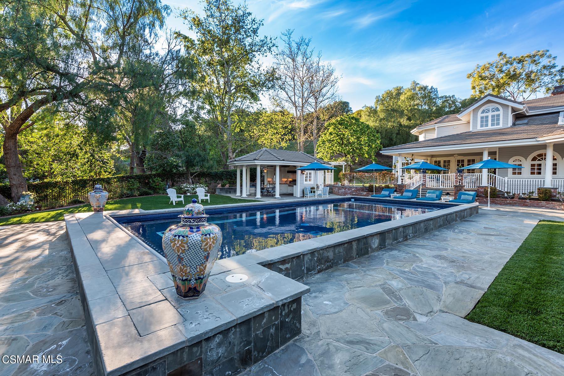 2155 Upper Ranch Road Westlake Village, CA 91362 - Photo 45 of 52 a view of a house with pool and chairs
