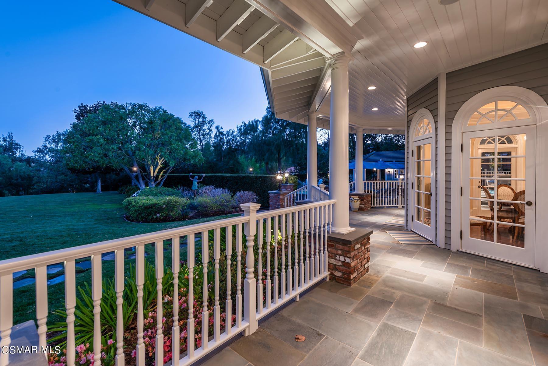 2155 Upper Ranch Road Westlake Village, CA 91362 - Photo 8 of 52 a view of a porch with a floor to ceiling window and a swimming pool