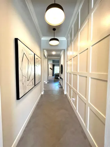 a view of a hallway with a couch