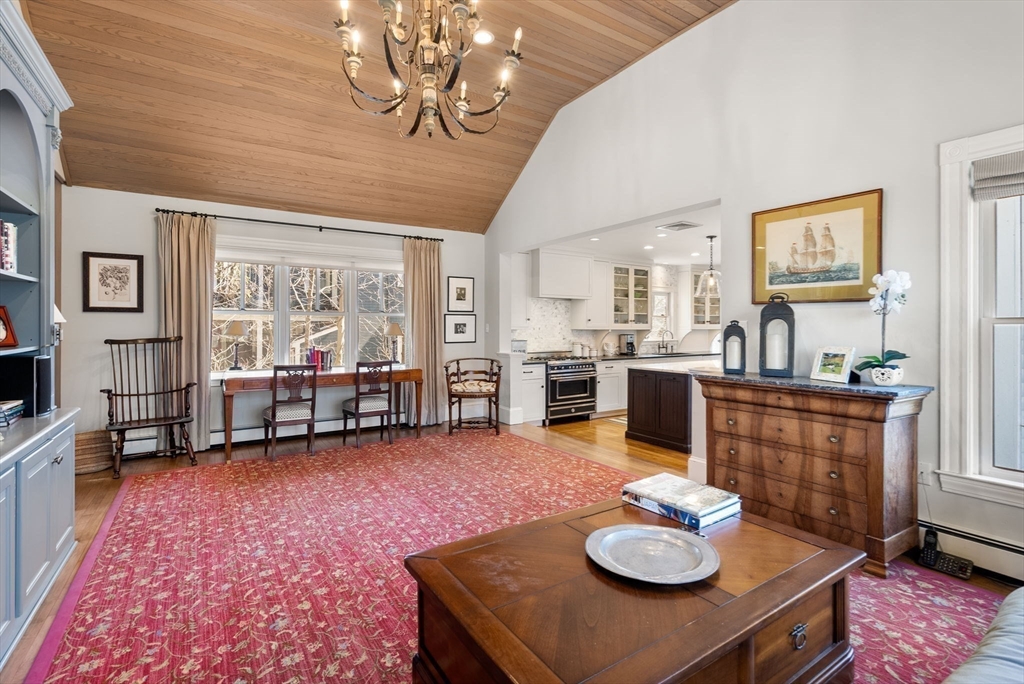 9 Maple Road Weston, MA 02493 - Photo 17 of 35 a living room with furniture and a dining table