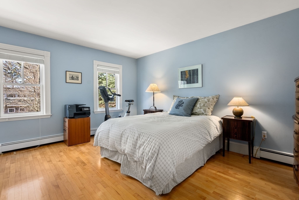 9 Maple Road Weston, MA 02493 - Photo 29 of 35 a bedroom with a bed and a couch