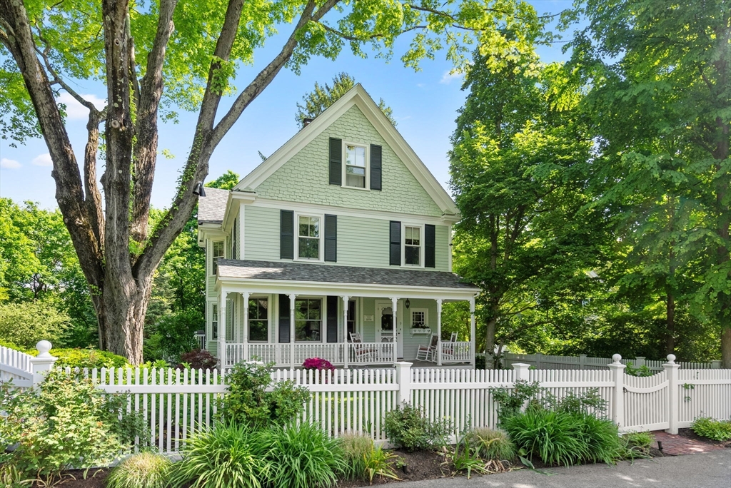 9 Maple Road Weston, MA 02493 - Photo 3 of 35 a front view of a house with a garden
