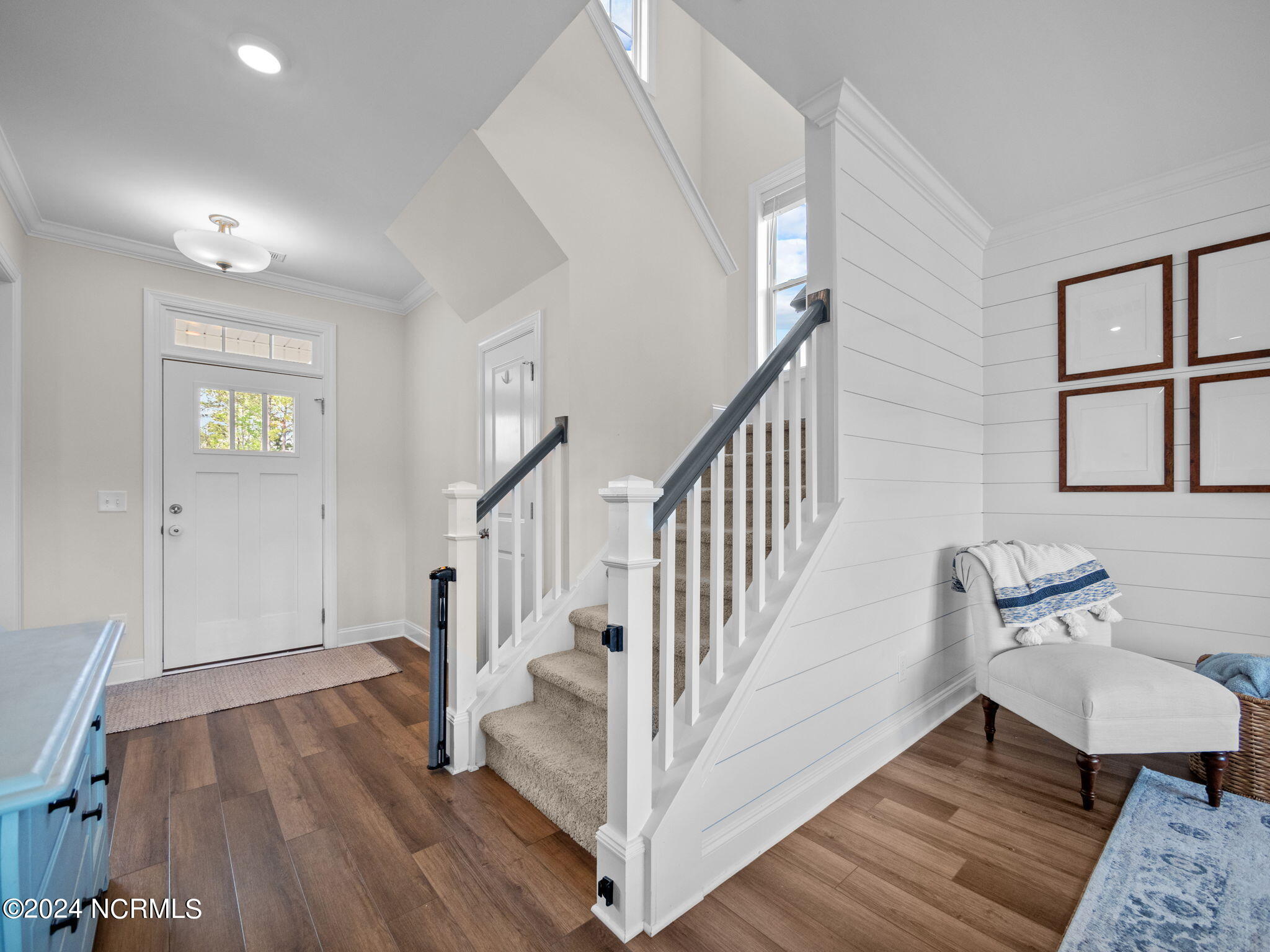 106 Northern Pintail Place Hampstead, NC 28443 - Photo 16 of 40 Shiplap Feature Living Room Wall