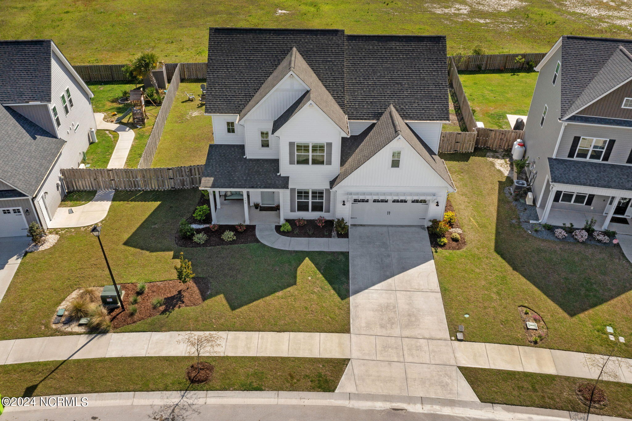 106 Northern Pintail Place Hampstead, NC 28443 - Photo 3 of 40 Aerial - Community Sidewalk