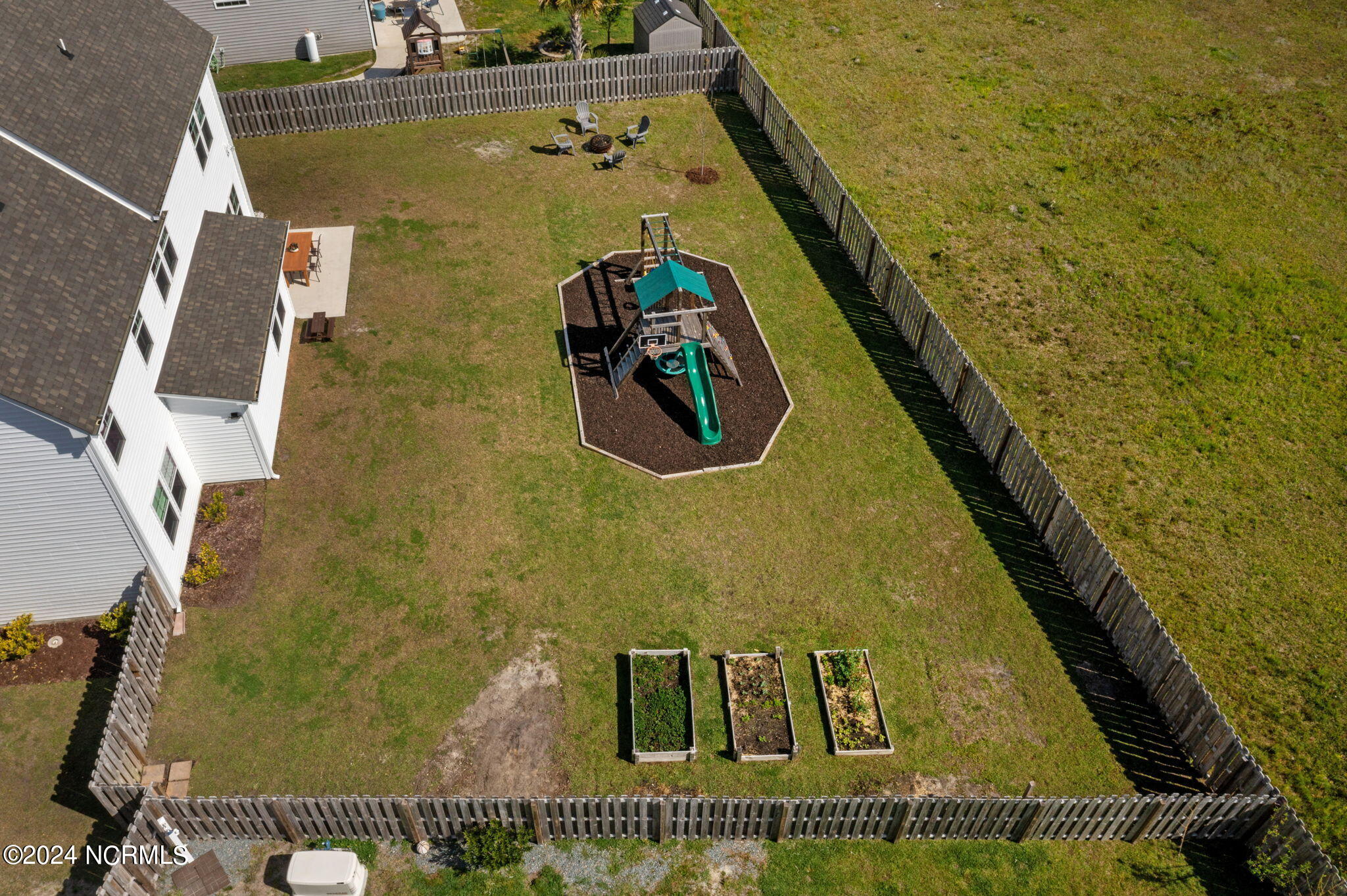 106 Northern Pintail Place Hampstead, NC 28443 - Photo 4 of 40 Fenced Backyard - Playset Stays