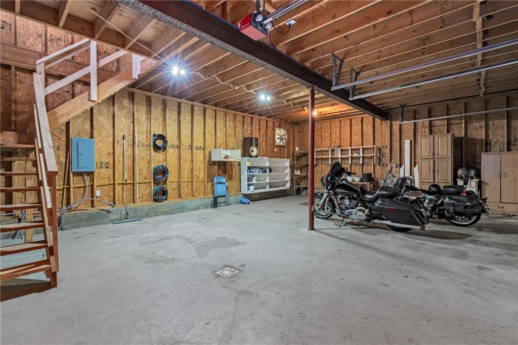 107 East School Street Mars, PA 16046 - Photo 27 of 37 a view of a garage with parked cars