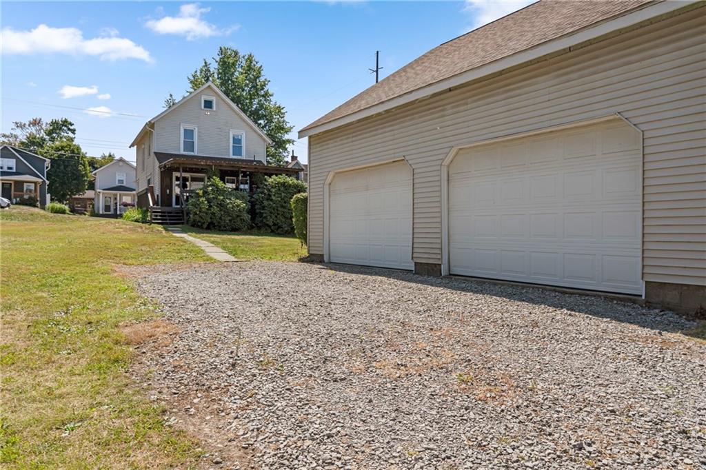 107 East School Street Mars, PA 16046 - Photo 29 of 37 a front view of a house with a yard