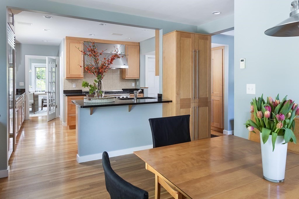 5 Agawam Road Newton, MA 02468 - Photo 11 of 23 a view of a dining room with furniture window and wooden floor