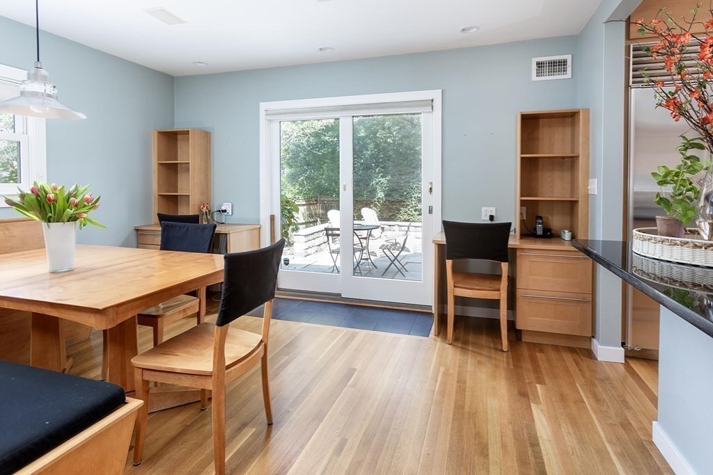 5 Agawam Road Newton, MA 02468 - Photo 12 of 23 a living room with furniture a table and wooden floor