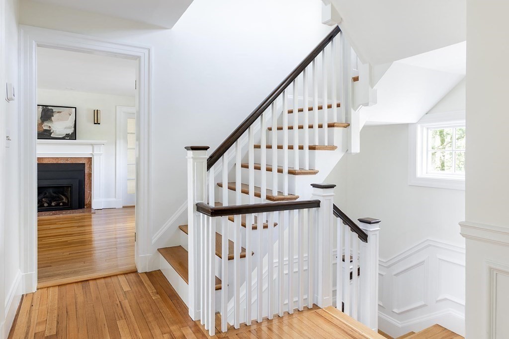 5 Agawam Road Newton, MA 02468 - Photo 14 of 23 a view of entryway with wooden floor and stairs