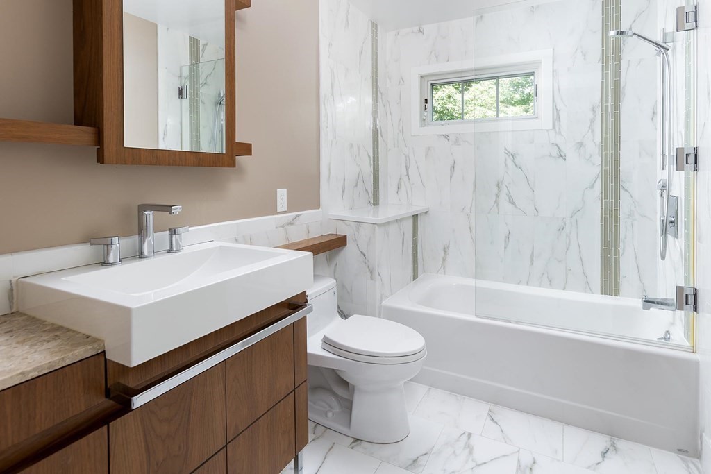 5 Agawam Road Newton, MA 02468 - Photo 17 of 23 a bathroom with a sink a toilet and a bathtub