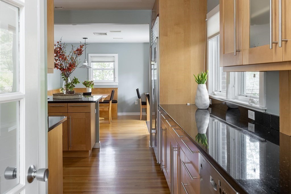 5 Agawam Road Newton, MA 02468 - Photo 10 of 23 a view of a hallway view with wooden floor and staircase