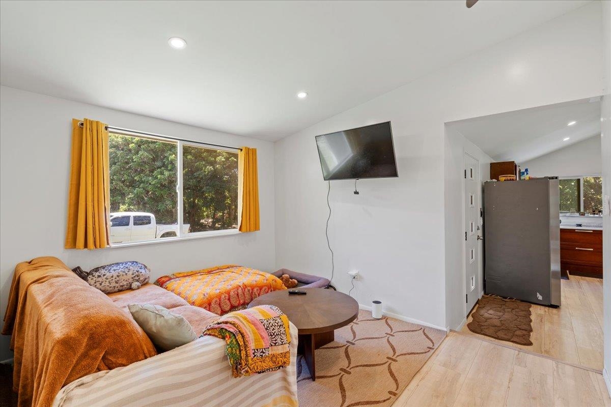 265 Hahana Road Haiku, HI 96708 - Photo 16 of 48 a living room with furniture and a flat screen tv