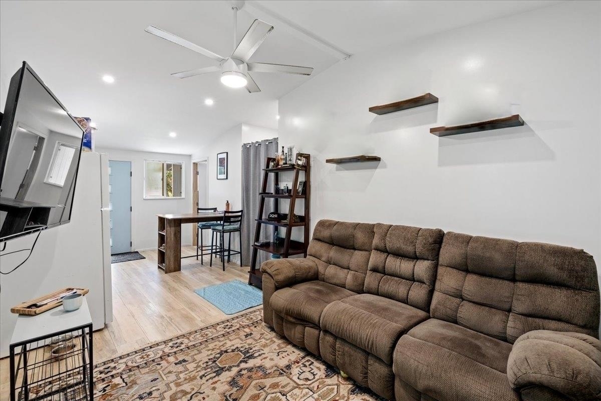 265 Hahana Road Haiku, HI 96708 - Photo 25 of 48 a living room with furniture and wooden floor