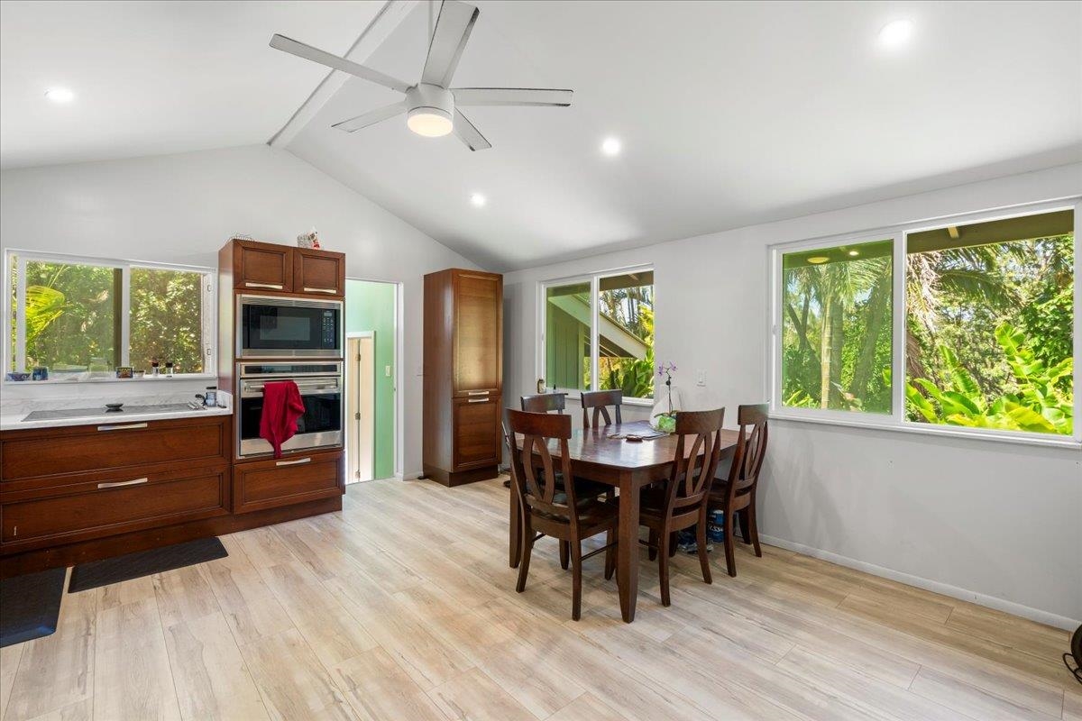 265 Hahana Road Haiku, HI 96708 - Photo 8 of 48 a view of a dining room with furniture window and wooden floor
