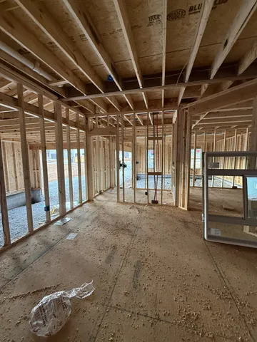 a view of a room with wooden walls