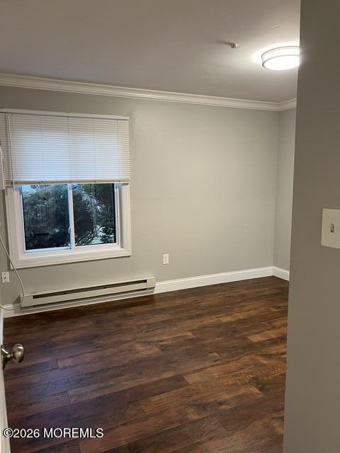 79 Overlook Way, Unit E Manalapan, NJ 07726 - Photo 5 of 8 a view of a small space with wooden floor and a window