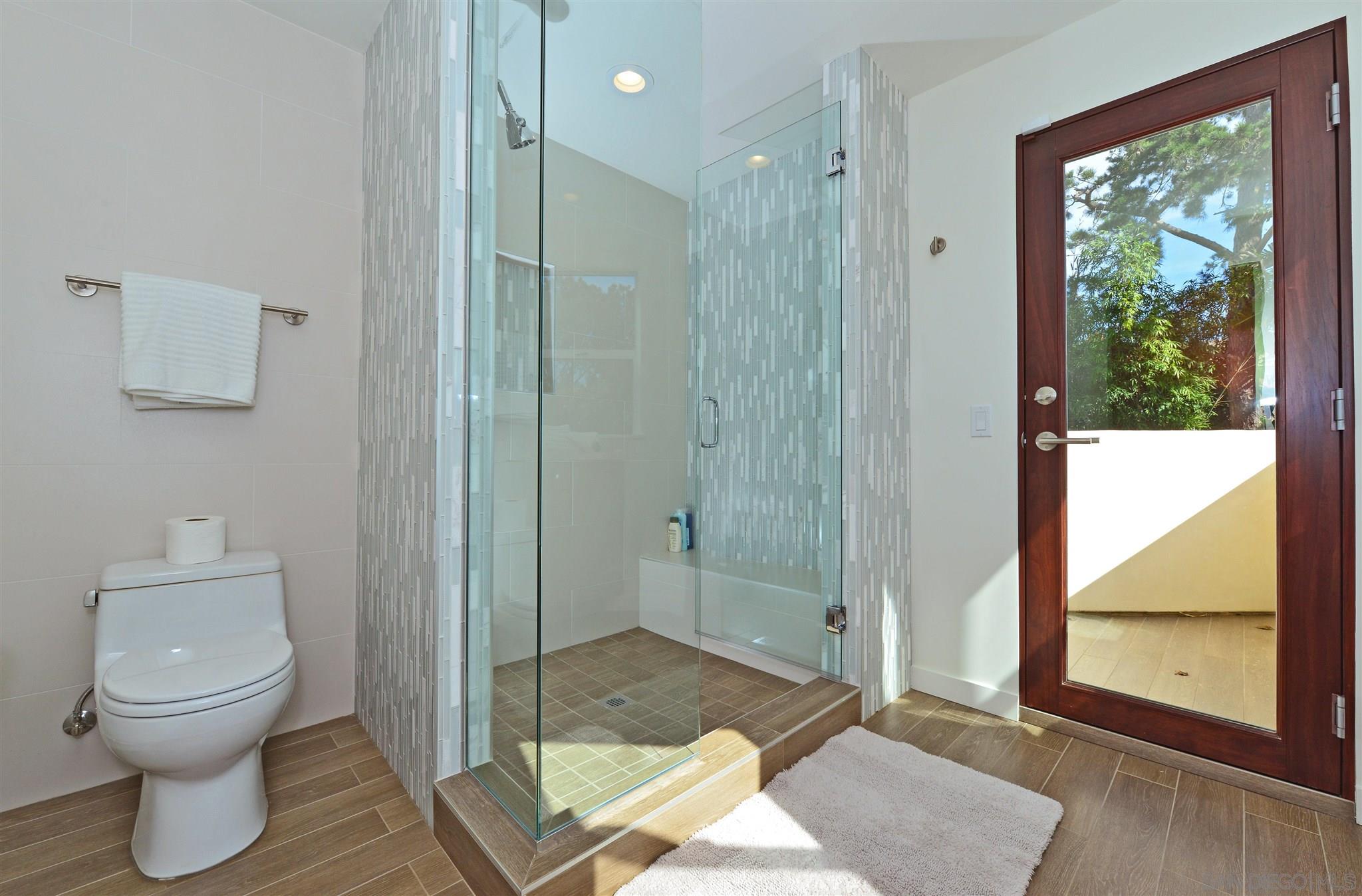 13721 Pine Needles Drive Del Mar, CA 92014 - Photo 26 of 32 a bathroom with a toilet shower and a sink