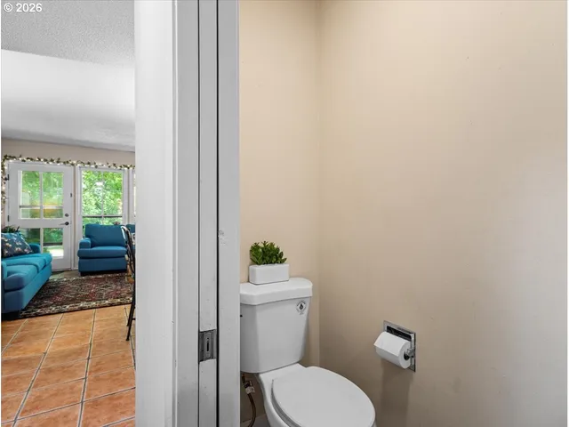 a view of a room with a bathroom
