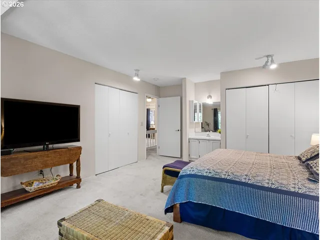a view of a backyard with a dining table and chairs