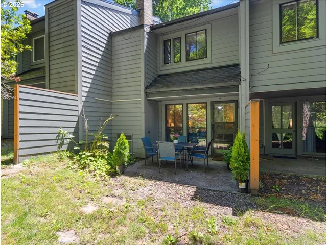 a view of a room with a wooden wall