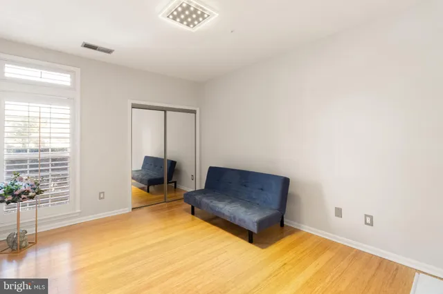 a view of a back yard from a balcony