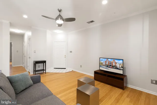 a kitchen with a refrigerator and washer