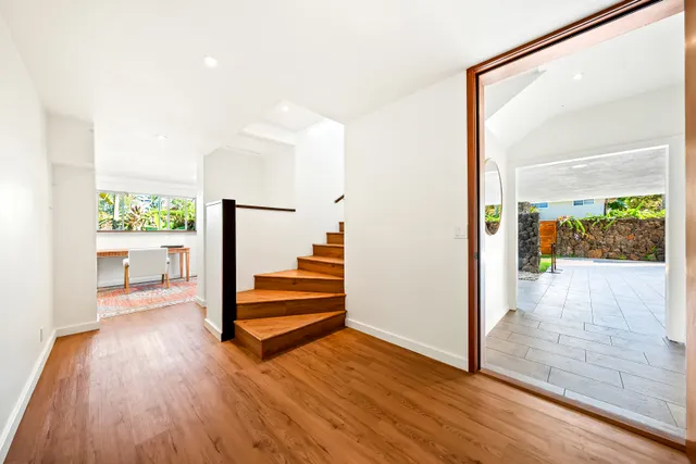 a view of front door and yard