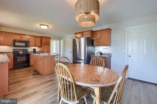 a view of a dining room with furniture
