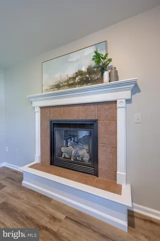 a bedroom with furniture and a potted plant