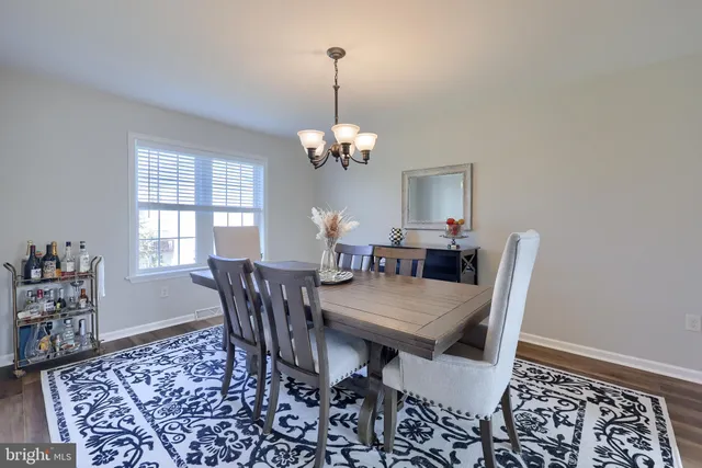 a room with furniture and white walls