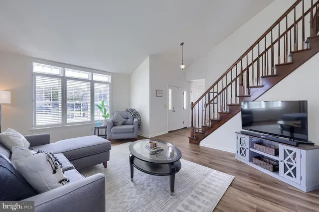 a bathroom with a sink a mirror and vanity