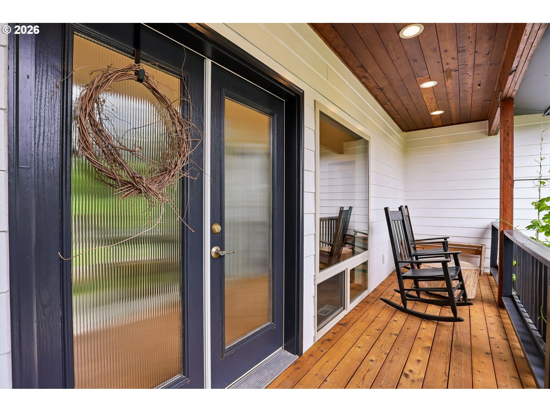 873 Mountain View Road Kalama, WA 98625 - Photo 6 of 45 a view of a balcony with furniture and wooden floor