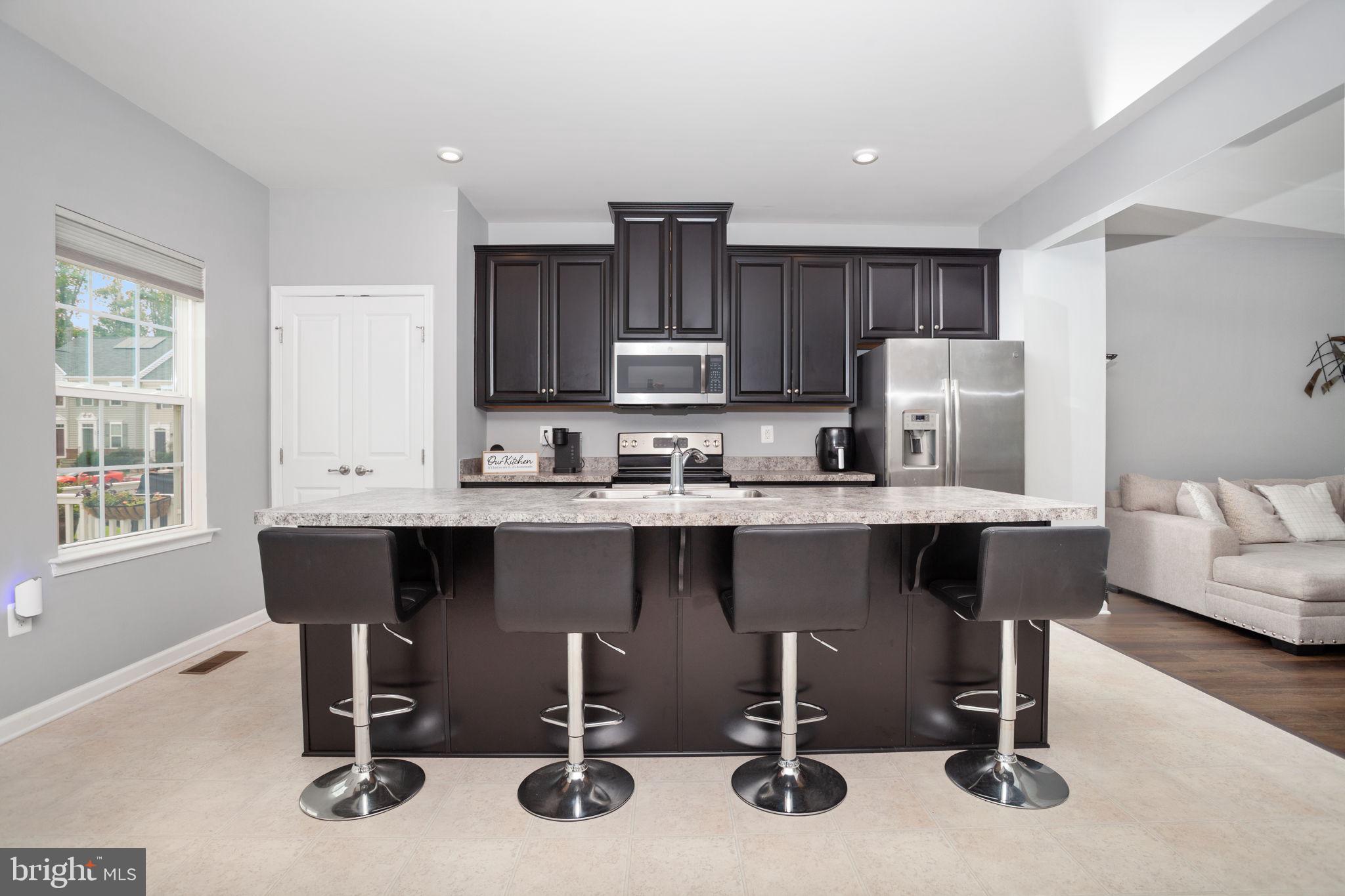 207 Rising Sun Road Fredericksburg, VA 22405 - Photo 8 of 24 Huge island adds prep space & seating for four