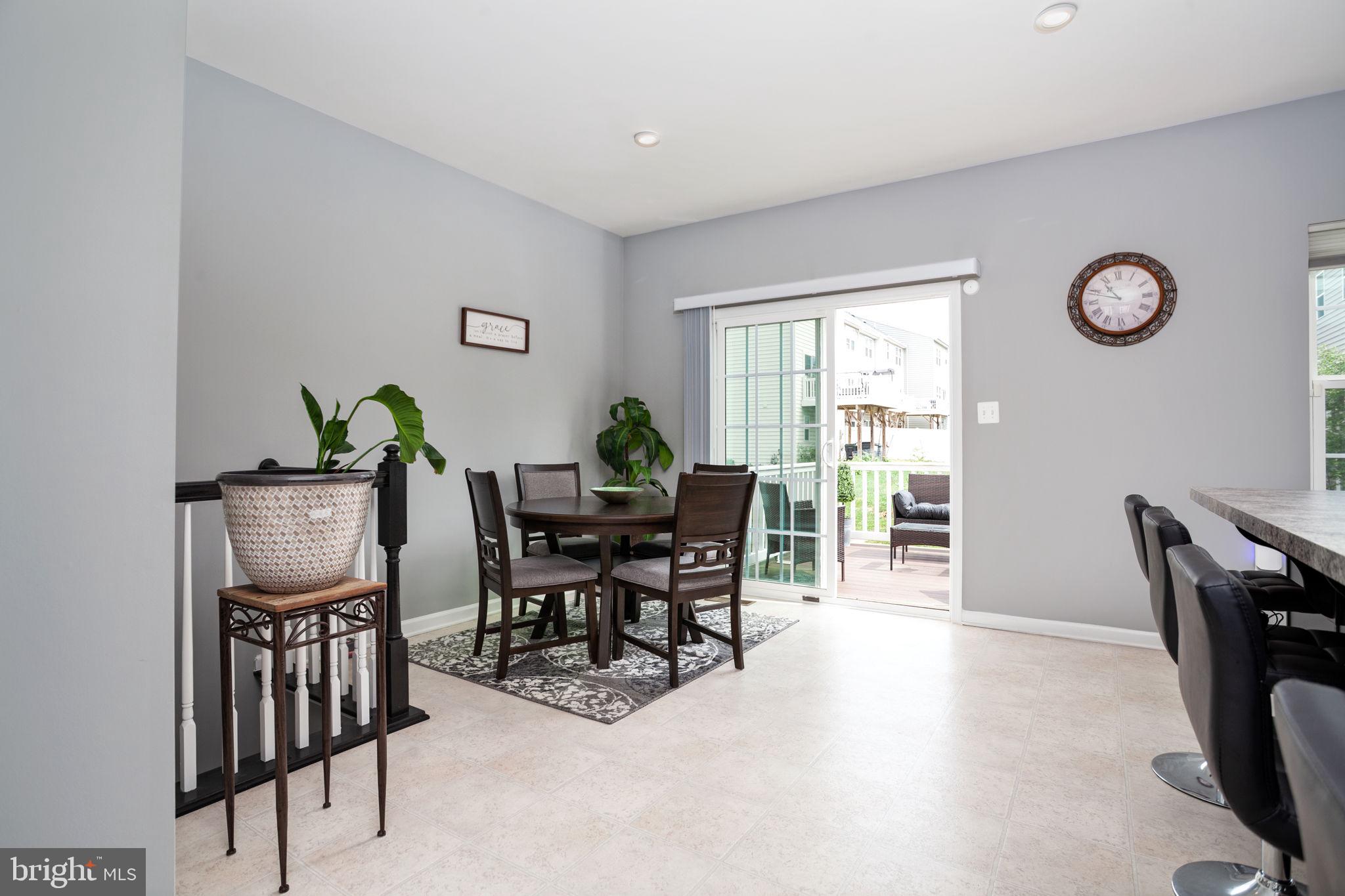 207 Rising Sun Road Fredericksburg, VA 22405 - Photo 9 of 24 Dining area seamlessly transitions to deck