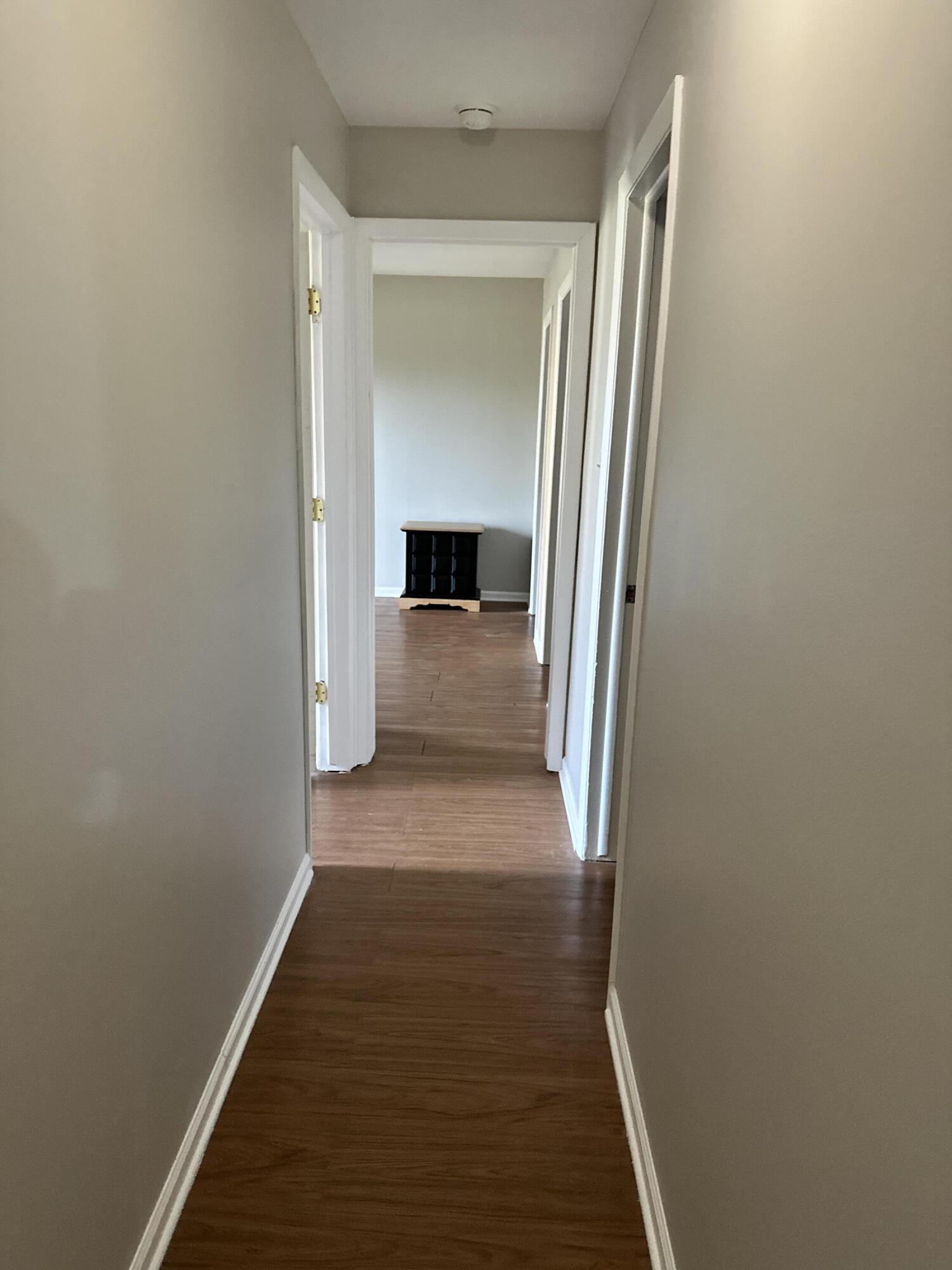 405 Old Stone Road, Unit E2 Munster, IN 46321 - Photo 18 of 20 a view of hallway with wooden floor