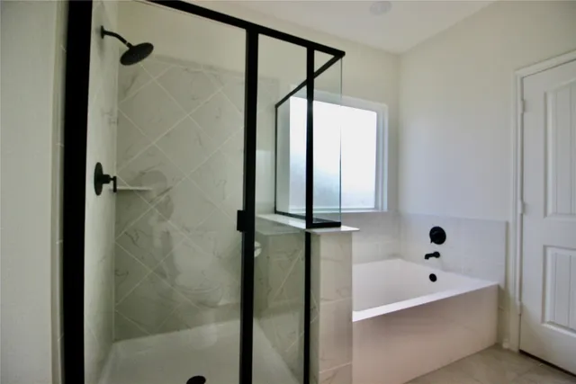 a bathroom with a double vanity sink toilet and mirror