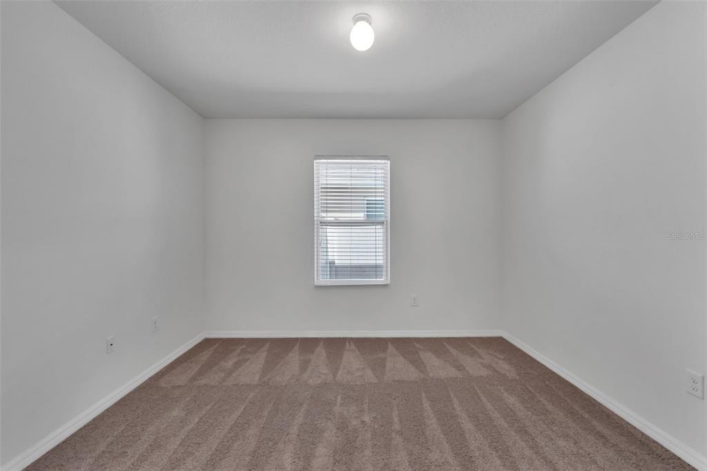 1828 Partin Terrace Road Kissimmee, FL 34744 - Photo 26 of 47 a view of an empty room and a window