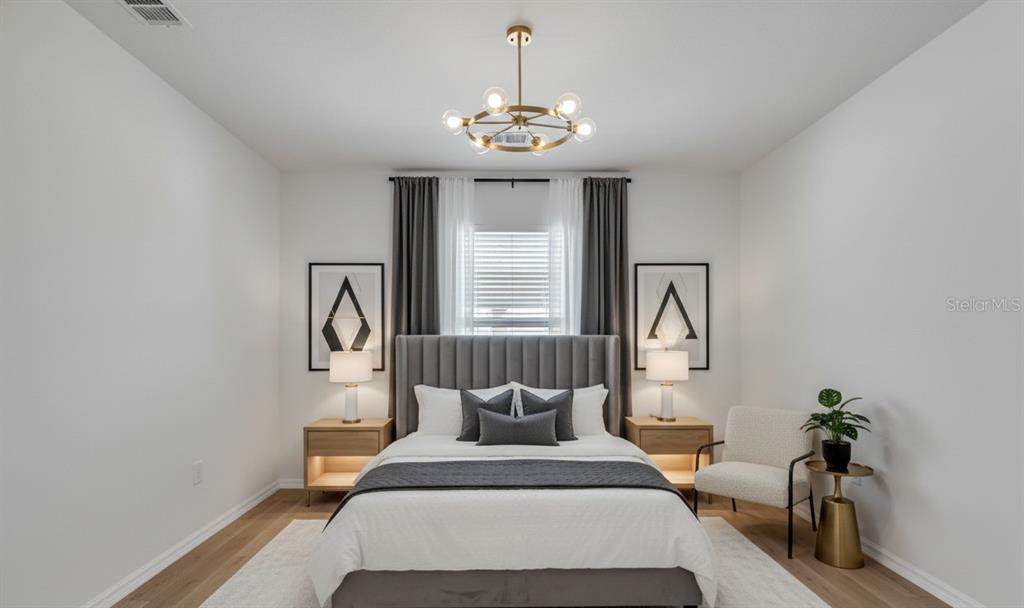 1828 Partin Terrace Road Kissimmee, FL 34744 - Photo 27 of 47 a bedroom with bed and a window