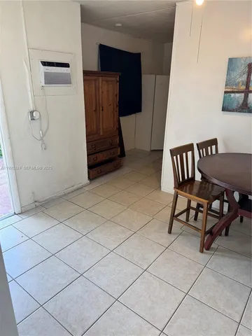 a view of a livingroom with furniture and a furniture