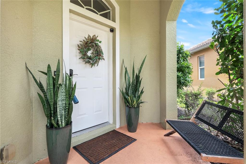 14846 Toscana Way Naples, FL 34120 - Photo 4 of 33 a view of balcony with furniture