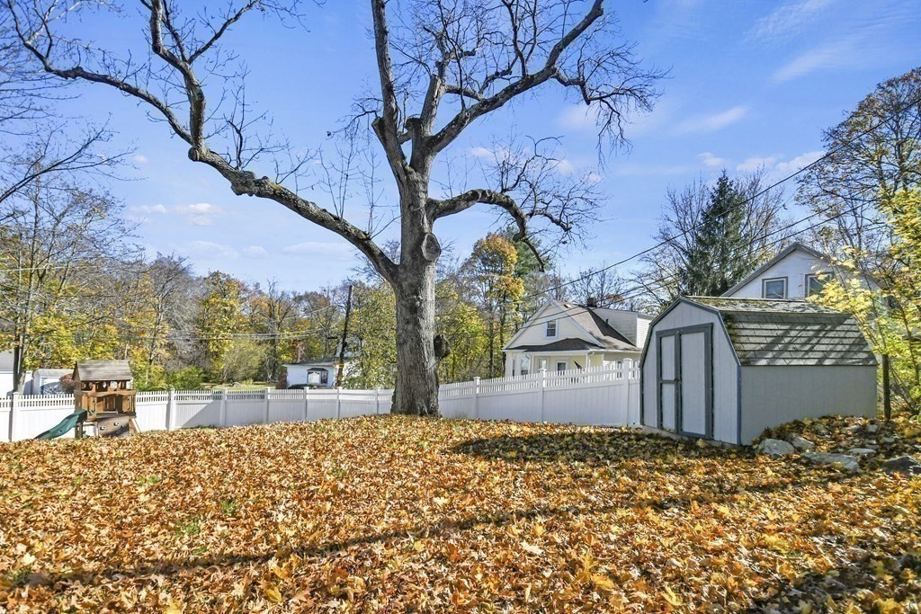 54 Thomas Street Dedham, MA 02026 - Photo 15 of 17 a view of a backyard