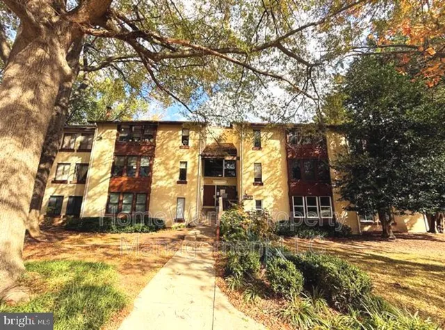 a front view of house with a yard